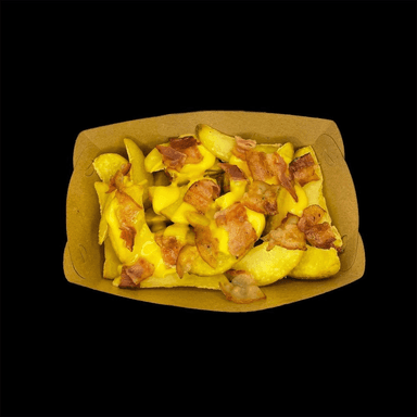 Картопля по-селянськи з соусом Чеддер та беконовим кранчем